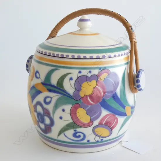 A Poole biscuit barrel with cane handle